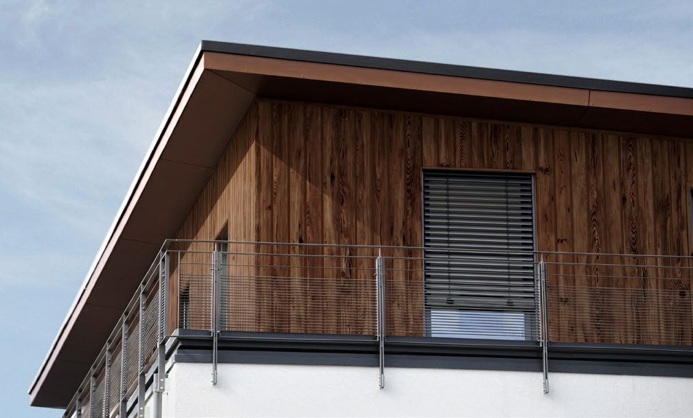 Budmat Fassadenlamellen Referenz – hinterlüftete Fassade in Dekor-Optik