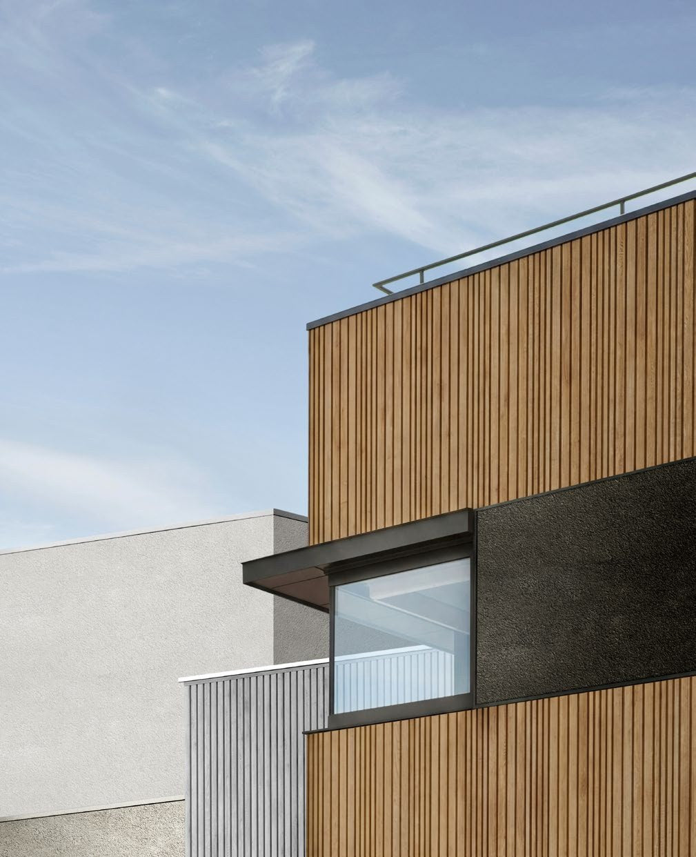 Budmat Fassadenlamellen Referenz – hinterlüftete Fassade in Dekor-Optik