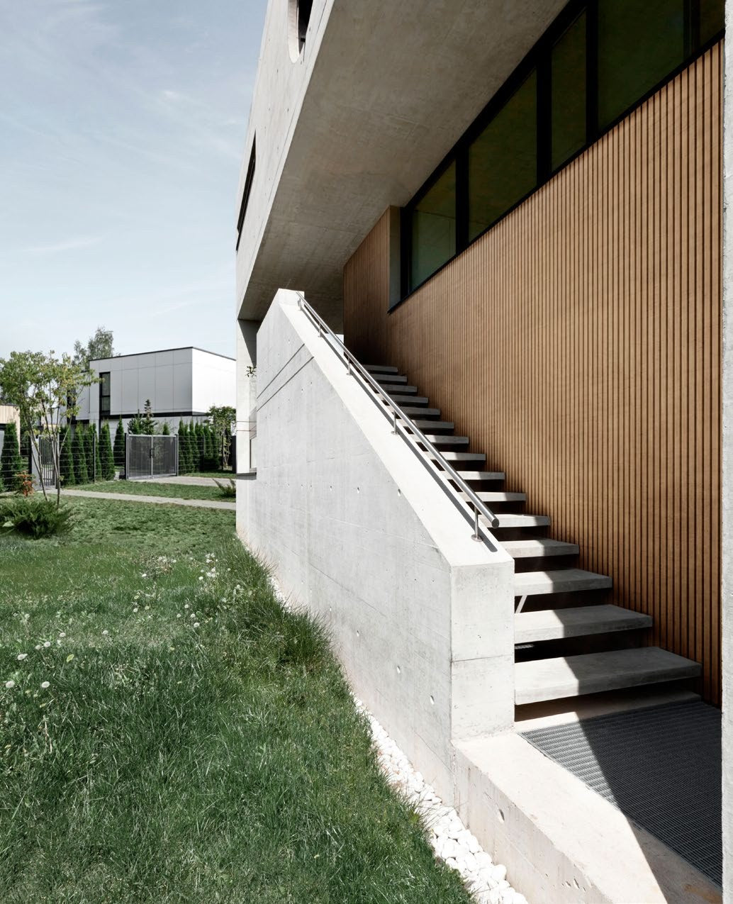 Budmat Fassadenlamellen Referenz – hinterlüftete Fassade in Dekor-Optik