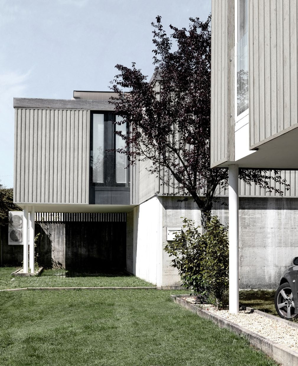 Budmat Fassadenlamellen Referenz – hinterlüftete Fassade in Dekor-Optik