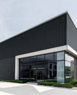 Budmat Fassadenlamellen Referenz – hinterlüftete Fassade in Dekor-Optik