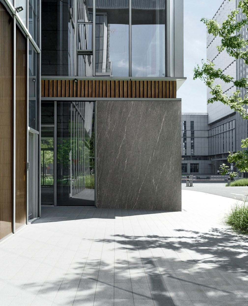 Budmat Fassadenlamellen Referenz – hinterlüftete Fassade in Dekor-Optik